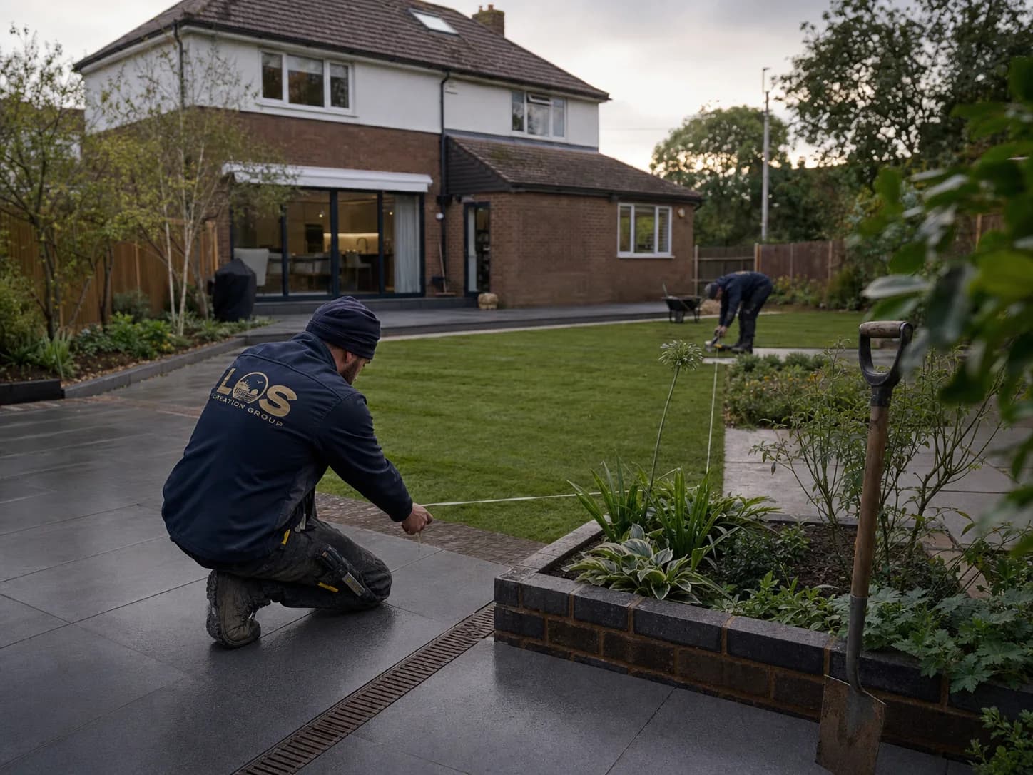 Editorial concept of a generous Basildon garden and porcelain terrace being landscaped