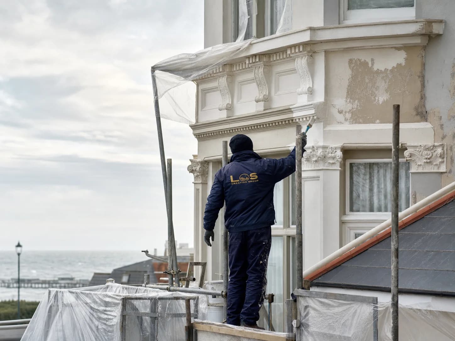 Editorial concept of careful exterior painting at a Tendring coastal home